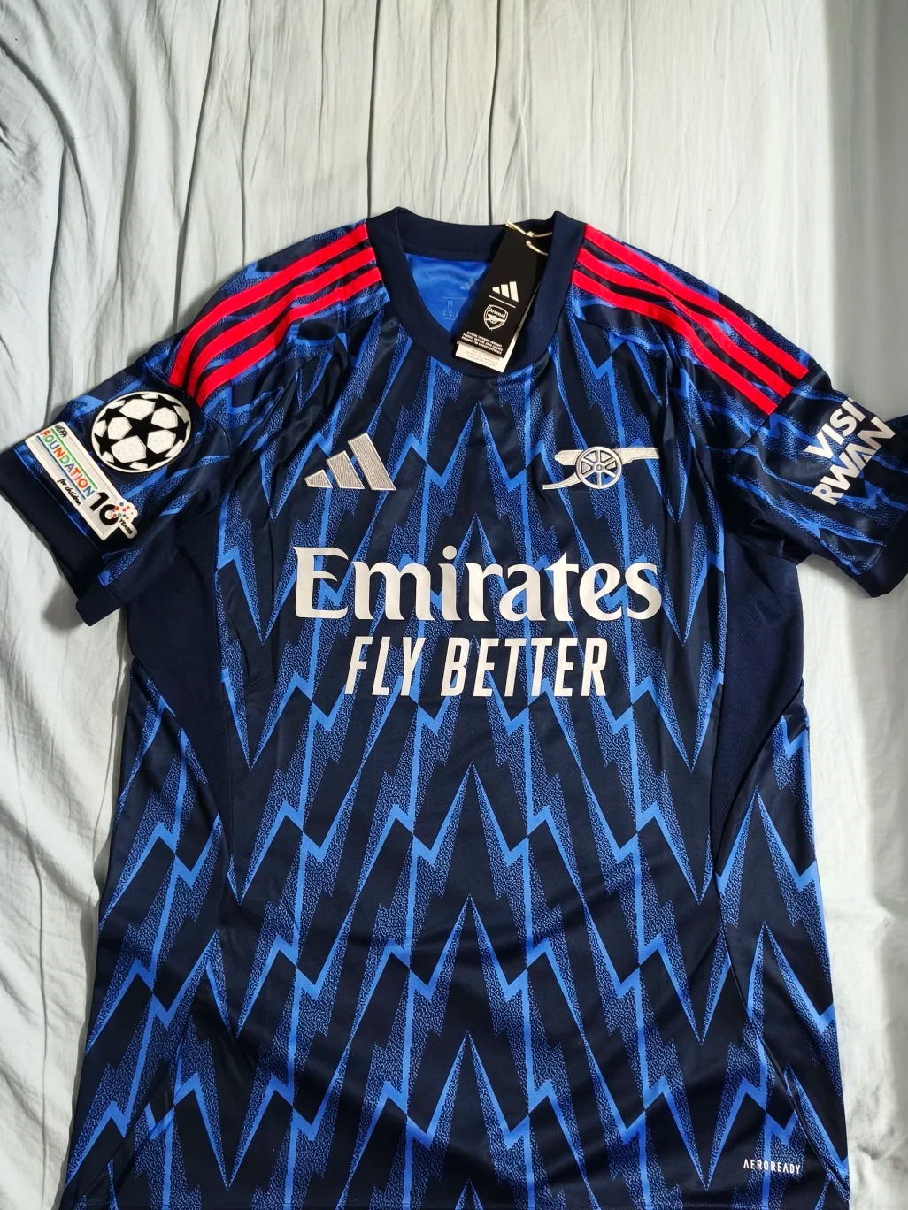 Blue Arsenal away is louder in person customer review